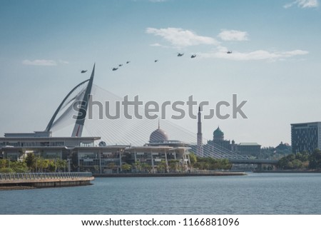 Photo of Royal Malaysian Airforce aircraft and fighter jet flying over Putrajaya for Malaysia National Day 2018