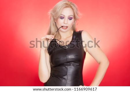 Fashion portrait blonde woman in autumn style