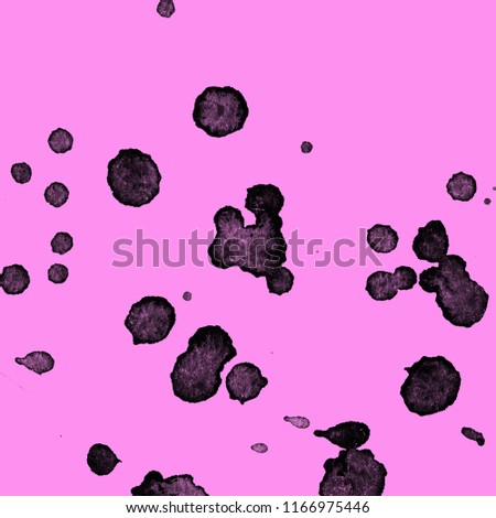 Isolated artistic black watercolor and ink paint splatter textures and decorative elements on pink paper background.
