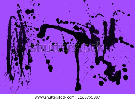 Isolated artistic black watercolor and ink paint splatter textures and decorative elements on violet paper background.