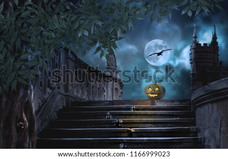 Halloween pumpkins in yard of of old stone staircase night in bright moonlight