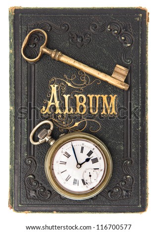 vintage poetry album with old key and clock decoration isolated on white background
