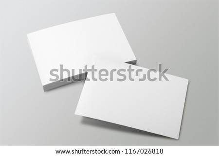 Blank portrait A4. brochure magazine isolated on gray, changeable background / white paper isolated on gray Royalty-Free Stock Photo #1167026818
