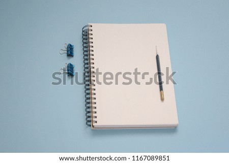 notepad on a blue background
