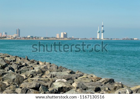 A Beautiful View On The Shores Of The Persian Gulf.  A Beautiful Picture With Kuwait Towers  At The Horizon.