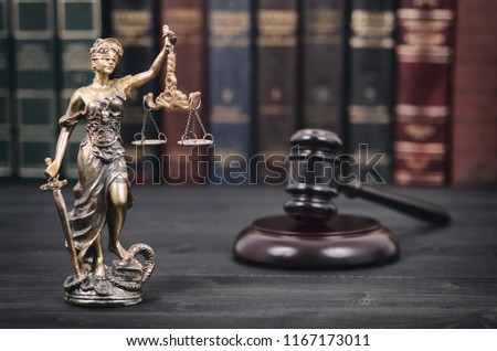 Law and Justice , Legality concept, Judge Gavel and Lady Justice on a black wooden background.