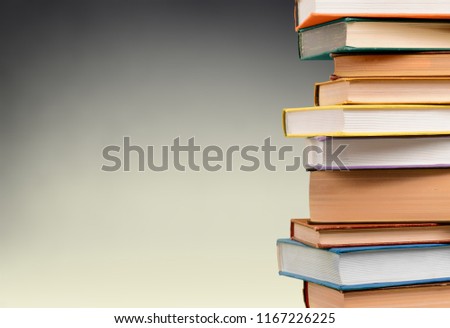 Old Books stacked on background.