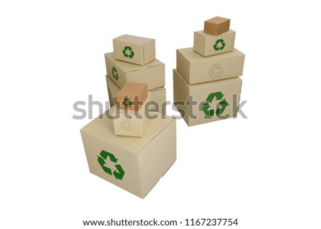 Cardboard boxes with Recycle Sign in different sizes stacked boxes isolated on white background with clipping path