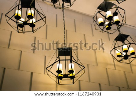 Picture of modern metallic stylish hang ceiling lamps with beautiful wall background