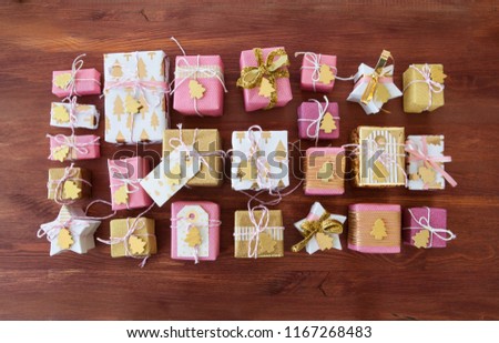 Little presents in festive gift wrapping for christmas
