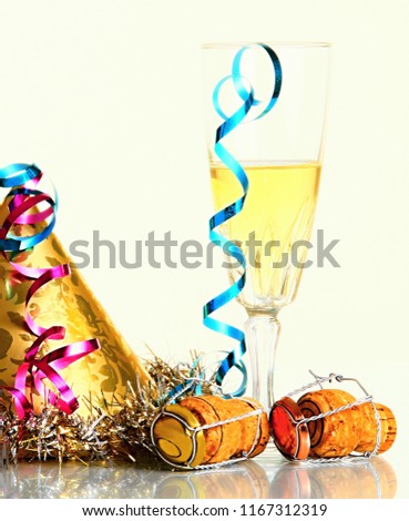 New Year's celebration with glass of wine on white background no people stock photo