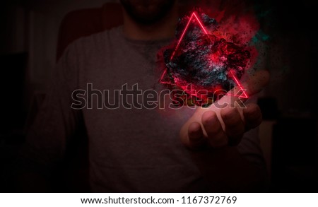 Space abstract background, burning comet, flash, on the hand of the man, bright colors