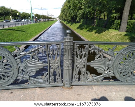 Decorative streets fence from metal at very famous bridges in Saint-Petersburg