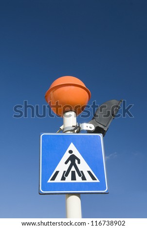 Low angle view of a pedestrian crossing signboard, Malta