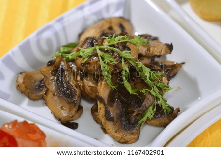 A variety of Chinese cuisine, close up cuisine, enlarged picture, fried mushrooms