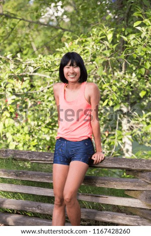 Asian Athlete Relaxing Chilling in The Park