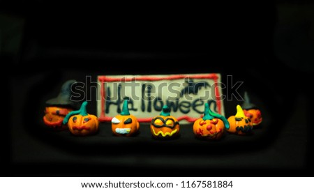 ็Handmade devil pumpkin  from the soil, Concept Halloween.