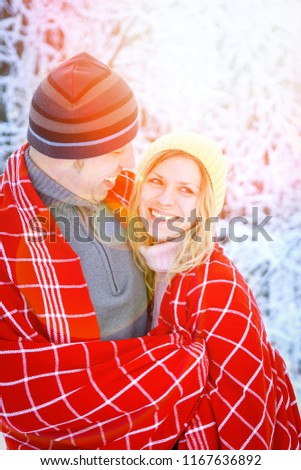 Couple in the park in winter