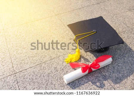 Black Graduation cap and  degree on background. Tool for education. Academic , achievement, Photo Education and Success idea.