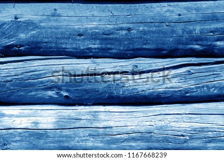 Old wooden wall in navy blue color. Abstract background and texture for design.