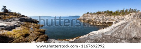 Panoramic Landscape view of the rocky Island during a vibrant sunny summer day. Taken near Powell River, Sunshine Coast, BC, Canada.