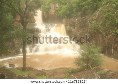 Chart Trakan Waterfall, Paradise waterfall in Tropical rain forest of Thailand , water fall in deep forest at Pitsanolok province Thailand . 