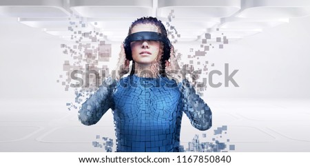 Digital composite of woman with a virtual reality simulator against close-up of pixelated gray 3d man