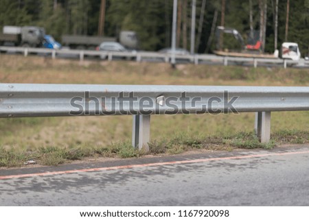Safety barrier on freeway bridge