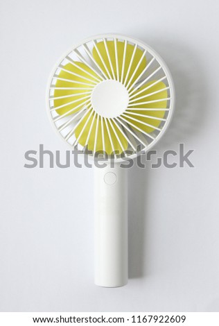 white and yellow Portable Mini Fan isolated on white background