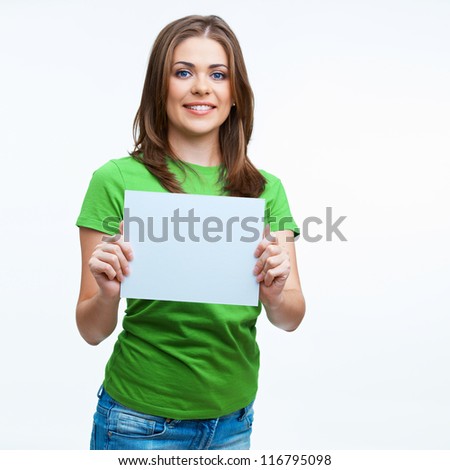 Woman sowing blank card. Isolated on white background smiling female portrait . Green color dressed.
