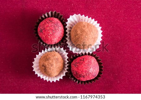 Dessert. Truffle candies in different colors.
Suitable for decoration of cafes, menus, banquets