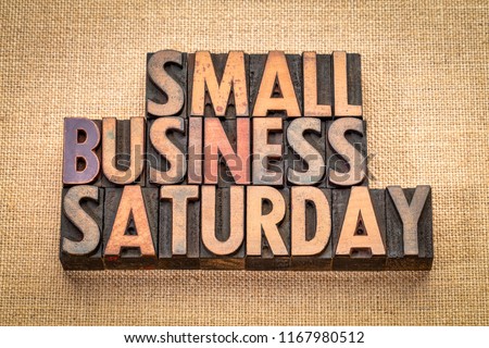 Small Business Saturday word abstract - text in vintage letterpress wood type against burlap canvas, holiday shopping concept Royalty-Free Stock Photo #1167980512
