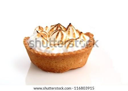 Lemon tart with meringue on white background
