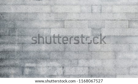abstract concrete wall grey and white block wall texture background interior rock stone with bright lighting Royalty-Free Stock Photo #1168067527