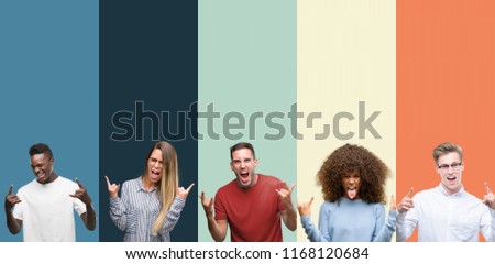 Group of people over vintage colors background shouting with crazy expression doing rock symbol with hands up. Music star. Heavy concept.