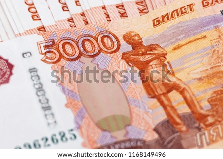Money in Russia. Close-up of Russian rubles in five thousand banknotes. Finance concept. Close-up 