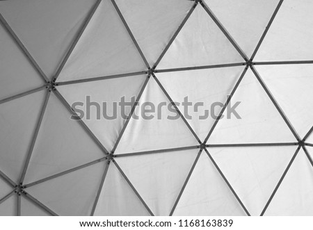 Photo of old geometric triangles white and black background