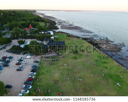 Aerial view with drone of the coast of San Isidro with people enjoying the day, Buenos Aires, Argentina