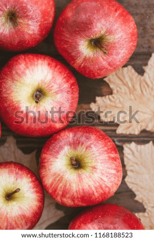 Harvest of ripe apples variety Red Delicious. Food background, top view, flat lay.
