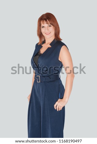 Modern beautiful business woman on gray background