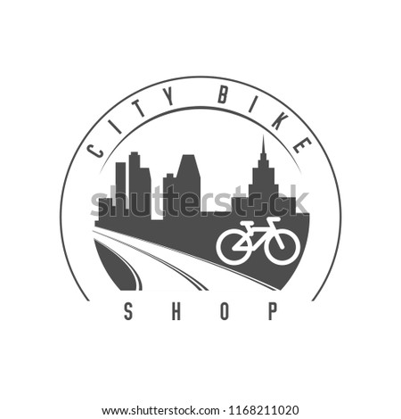 City Bike Shop Emblem, Badge. Monochrome Vector Illustration. Bend Road and Big City Skyline. Bicycle Simple Icon.