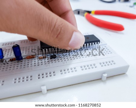Man fixing electronics