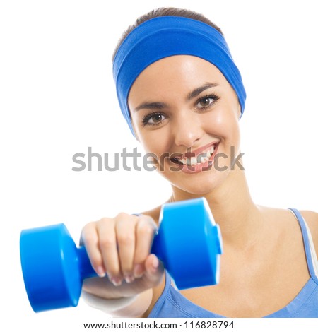 Cheerful woman in fitness wear exercising with dumbbell, isolated over white background