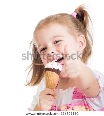 happy kid girl eating ice cream and showing thumb up