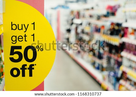 sign buy one get one 50 off Royalty-Free Stock Photo #1168310737