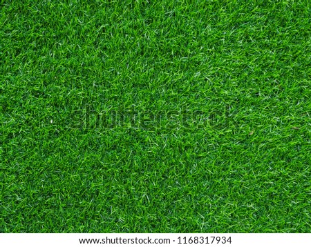 Green artificial grass background or texture.