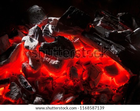 Closeup of charcoal burning.Burning charcoal texture.Very closeup hot texture