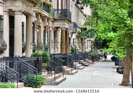 Upper West Side brownstone - New York residential architecture. Royalty-Free Stock Photo #1168615516