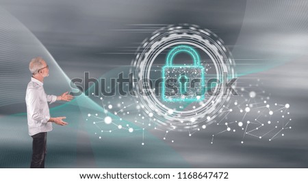 Businessman showing a digital security concept on a wall screen