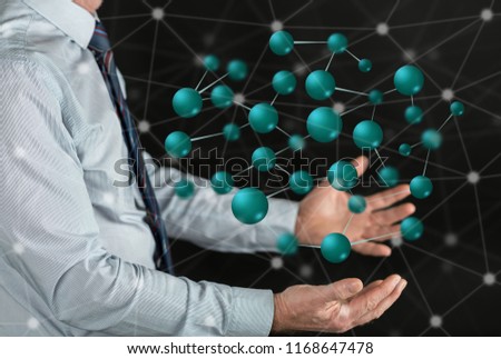 Network concept above the hands of a man